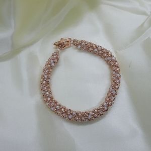 Rose gold and white opal hand beaded bracelet